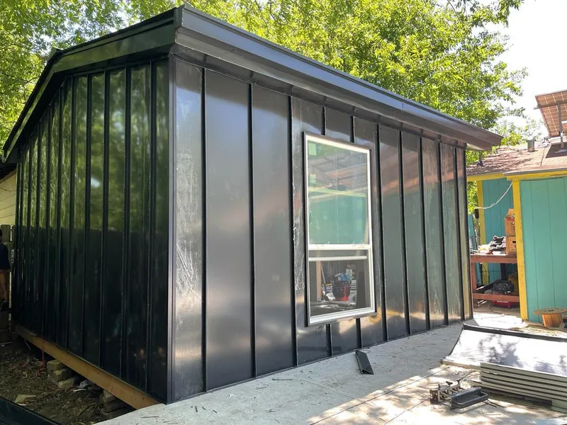 Black standing seam metal wall panels for Metal Roof Installation in Mendota