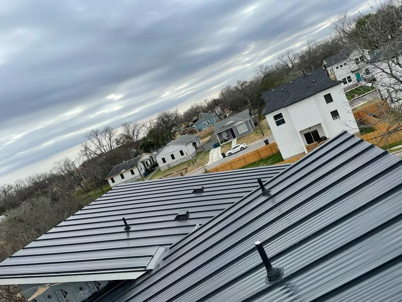 Standing seam metal roof panels with vents for Skylight Repair in Mendota